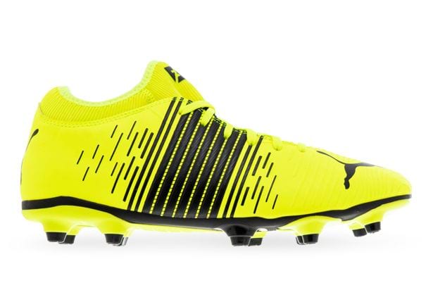 yellow and black puma boots